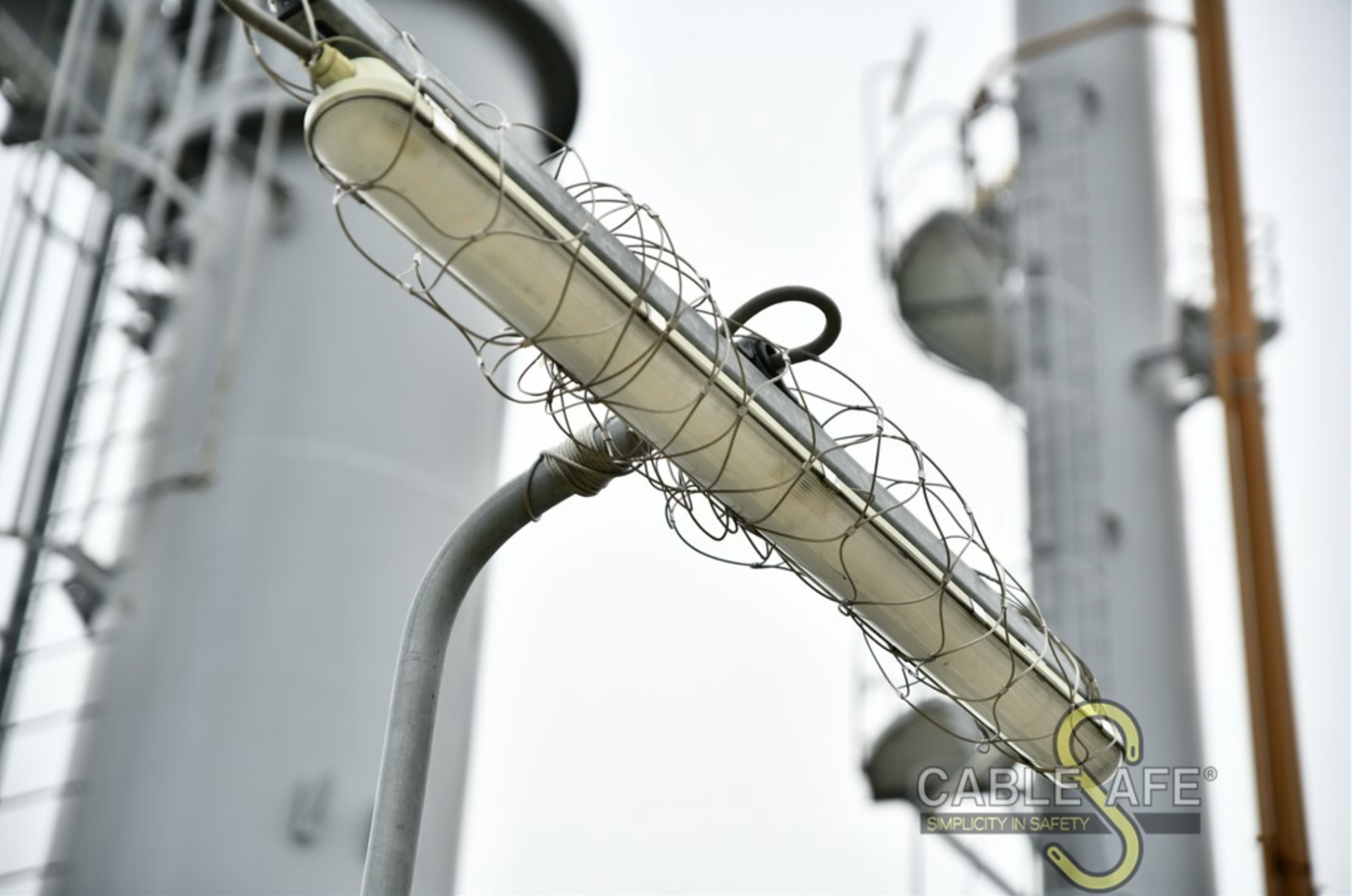 Mounted device with safety net